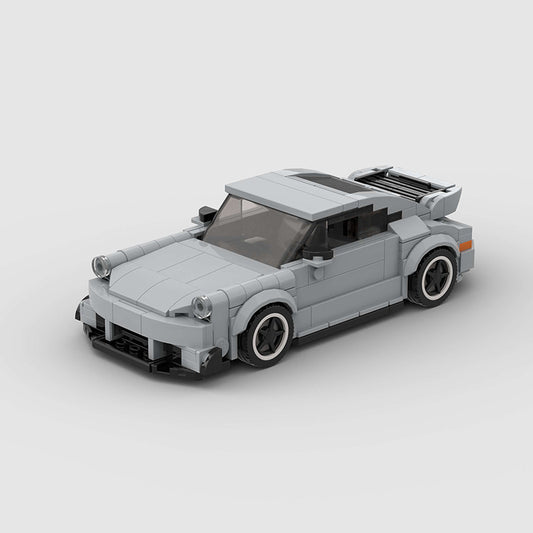 Porsche 911 RWB model by RevvBlox, featuring detailed bodywork and vibrant paint in a dynamic display.