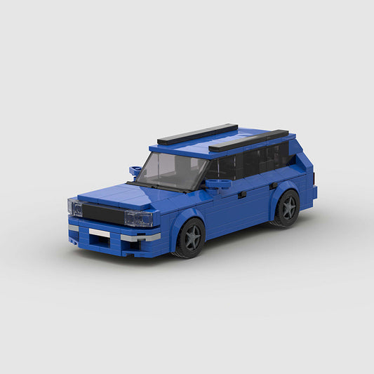 RevVBlox Audi RS2 model car in detailed plastic construction, showcasing the sleek design and vibrant color of the miniature vehicle.