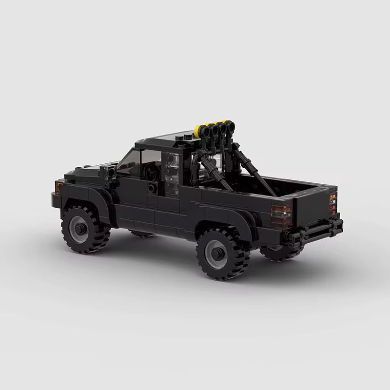 RevVBlox Toyota SR5 truck model with detailed exterior, showcasing blue truck with realistic design and branding.