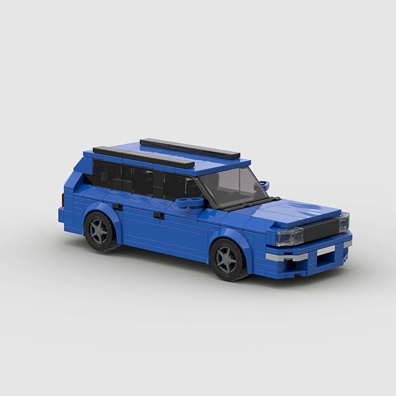 RevVBlox Audi RS2 diecast model car in black with detailed exterior and racing accents, showcasing realistic features and branding.