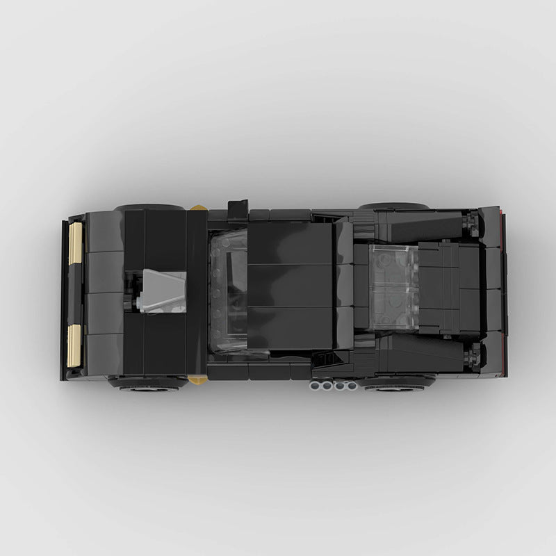 Detail of the RevvBlox 1973 Ford Falco V8 Interceptor model from Mad Max, showcasing the car's rugged design and distinctive features.