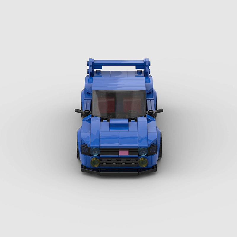 Red RevvBlox Subaru Impreza scale model car displayed on a plain background.