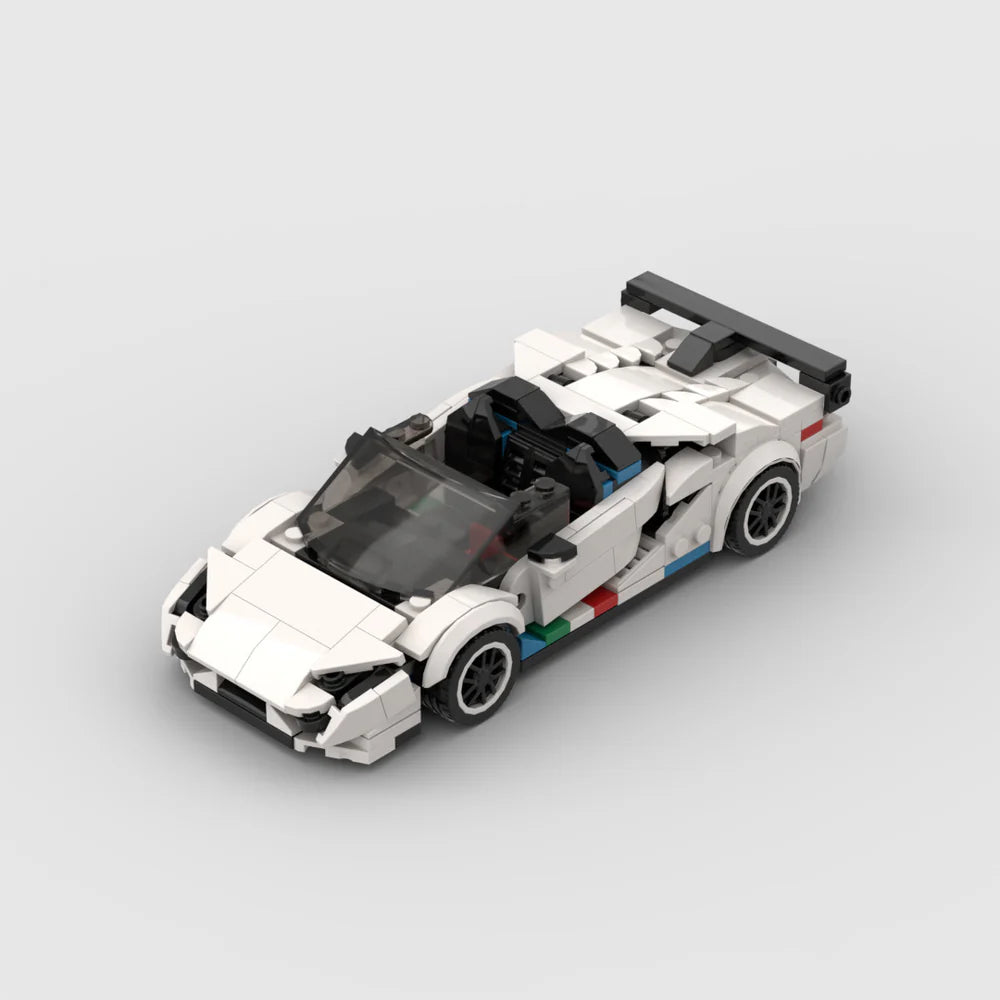 RevVblox Lamborghini Aventador SVJ Roadster diecast model car, detailed red and black sports car replica with sleek design.