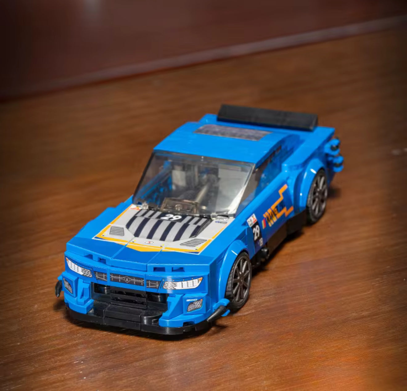 Revvblox Chevrolet Camaro Garage 56 model car in blue with detailed racing design, displayed on a white background.