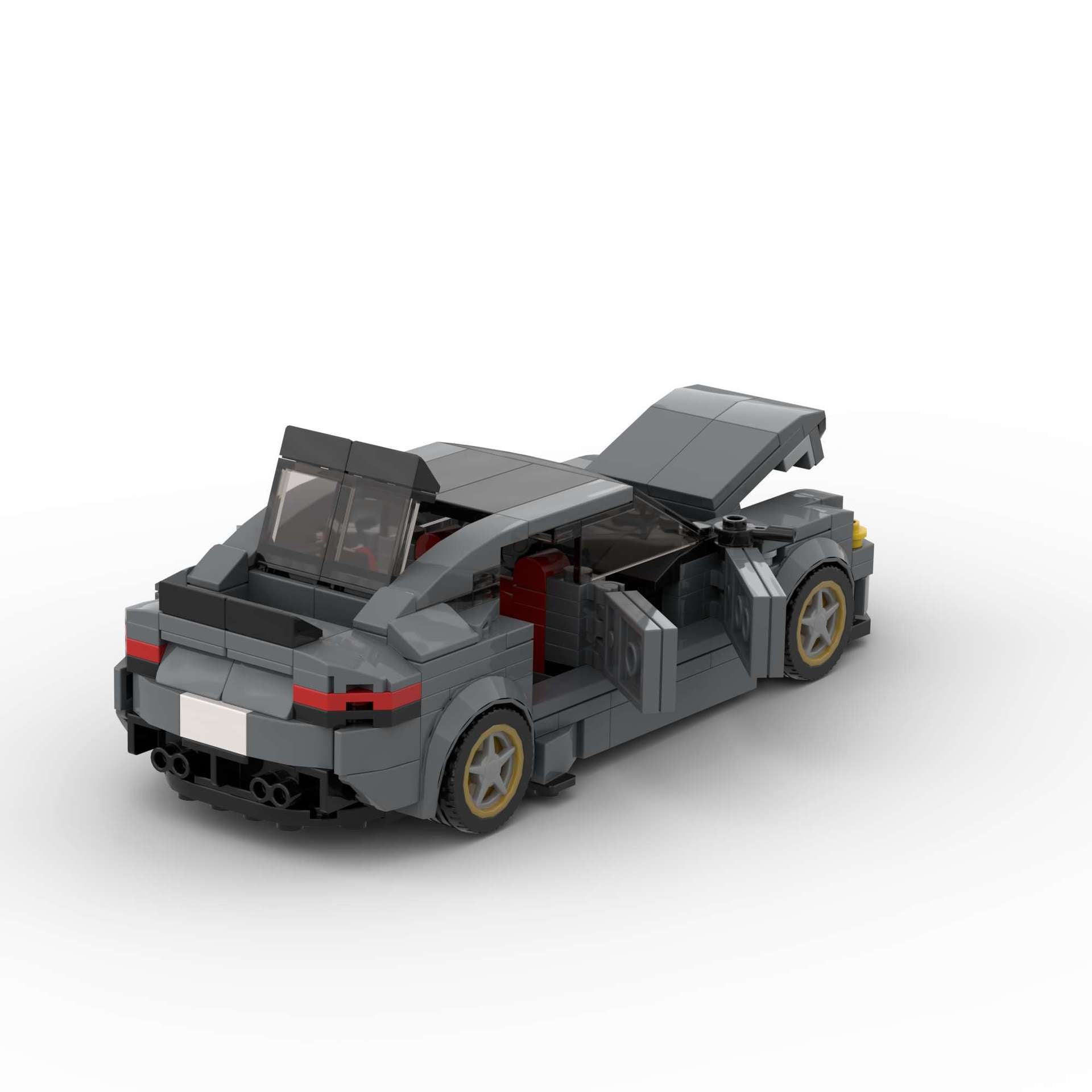 RevvBlox BMW M5 CS diecast model car with detailed exterior in black and silver, showcasing sporty design and intricate features.