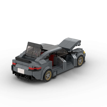 RevvBlox BMW M5 CS diecast model car with detailed exterior in black and silver, showcasing sporty design and intricate features.