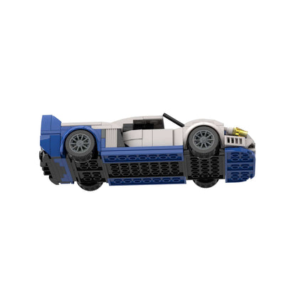RevvBlox Maserati MC12 model car with detailed blue and white racing design, showcasing sleek sports car features.