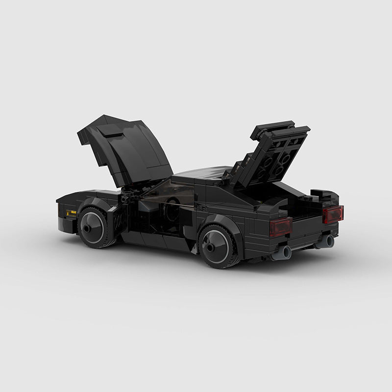 RevvBlox Night Rider car toy with sleek black and red design, detailed exterior, and realistic features for imaginative play.
