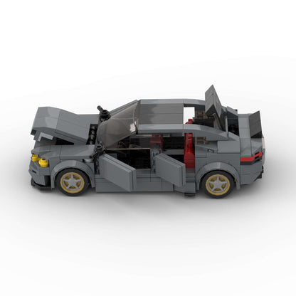 RevVBlox BMW M5 CS diecast model car with detailed exterior and interior features, showcasing the luxury sports vehicle.