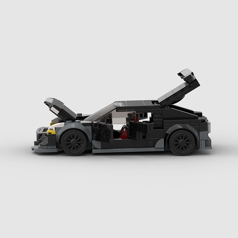 RevvBlox Tesla Model 3 Bionic toy car with detailed exterior and realistic design, showcasing a sleek electric vehicle model.