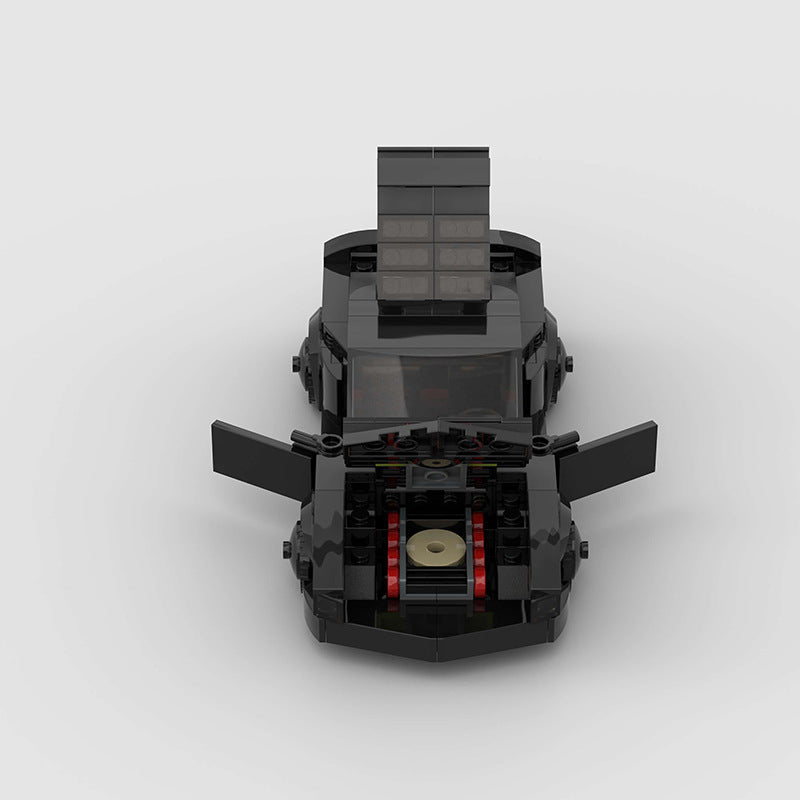 RevVblox Night Rider car toy with sleek black design and detailed features, perfect for imaginative play and collection.