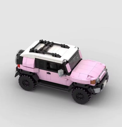 Pink Toyota FJ Cruiser toy car by RevvBlox, detailed miniature model with realistic features and vibrant color.