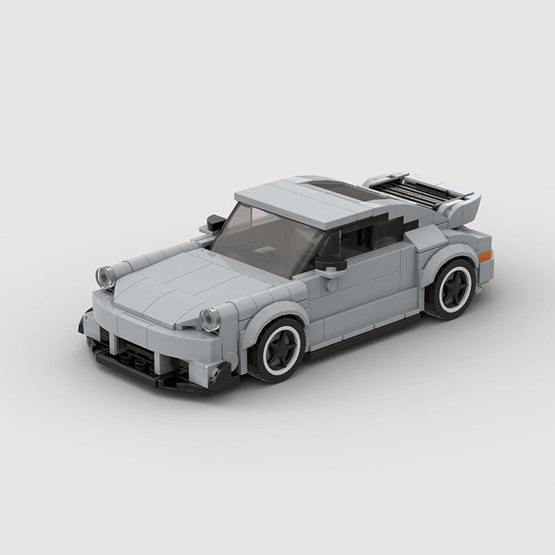 Porsche 911 RWB model by RevvBlox, featuring detailed bodywork and vibrant paint in a dynamic display.