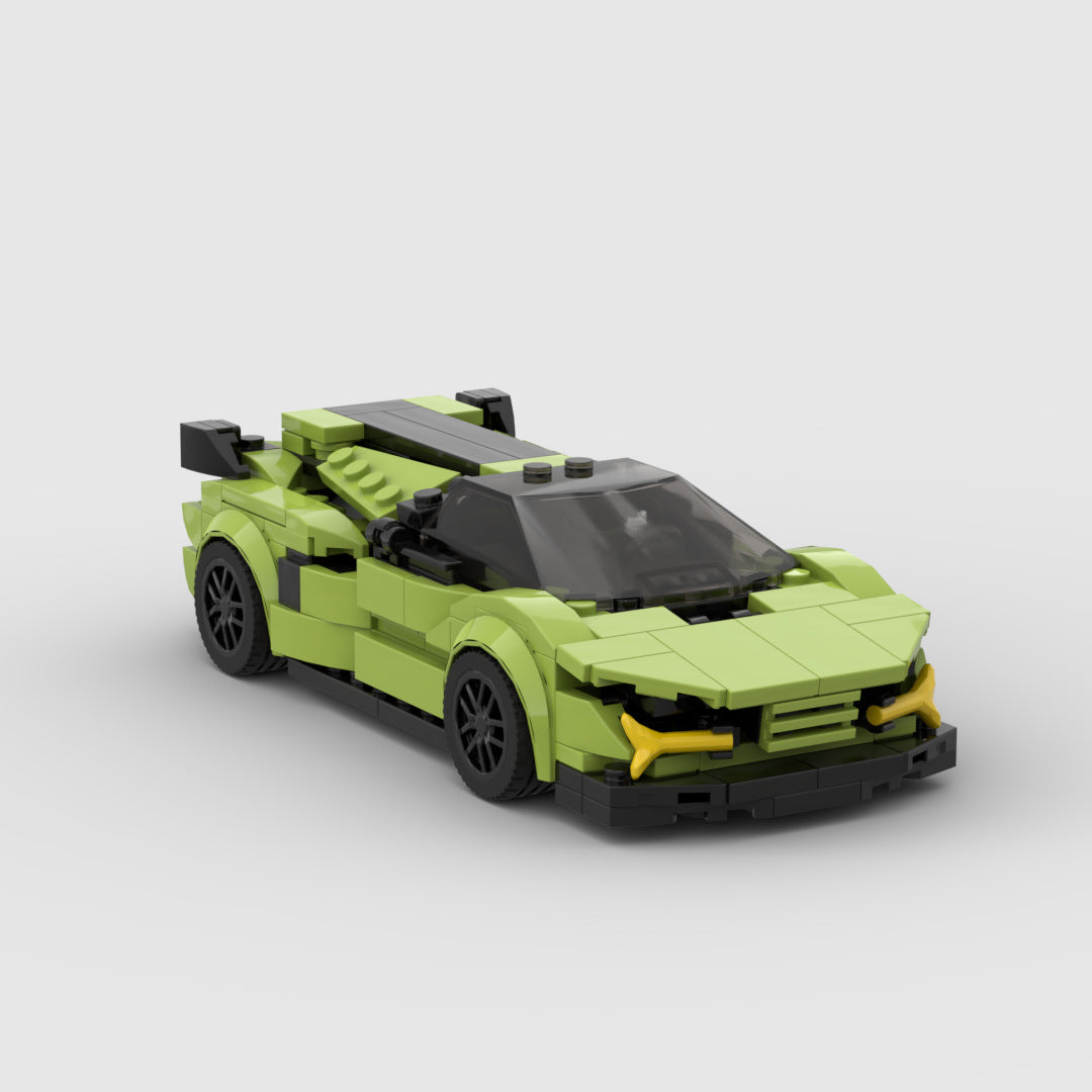 Green LEGO sports car model with black wheels and tinted windshield on white background