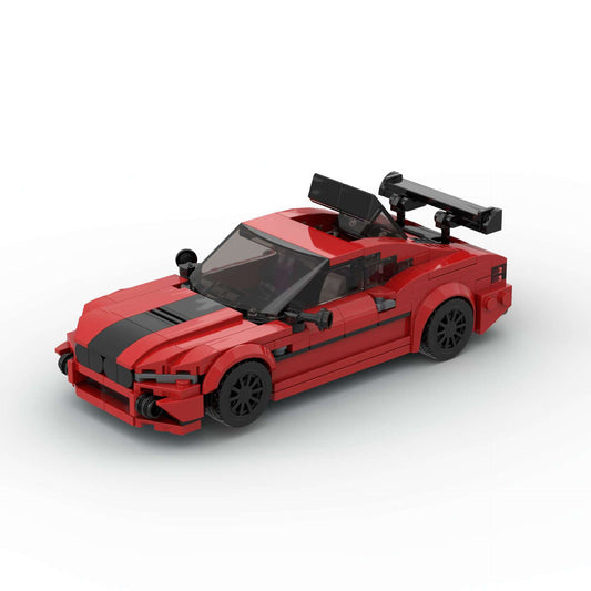 RevVBlox BMW M8 diecast model car with detailed exterior and interior features on a white background.