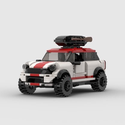 LEGO style off-road vehicle with red and white body, black roof gun turret, and rugged tires