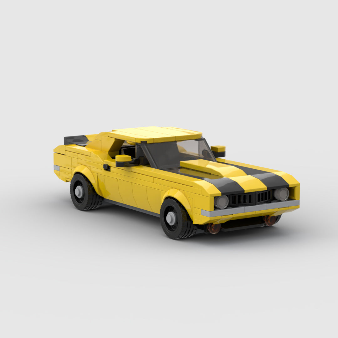 RevvBlox 1969 Chevrolet Camaro Z28 die-cast model car with detailed features and vibrant paint, displayed on a plain background.