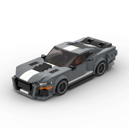 RevVBlox Ford Mustang Shelby GT500 model car with detailed red and black design, showcasing the iconic muscle car silhouette.