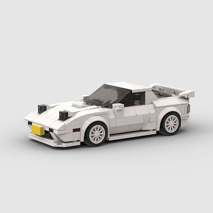 RevBlox Mazda RX-7 FC3S scale model car with detailed red exterior and sleek sporty design.