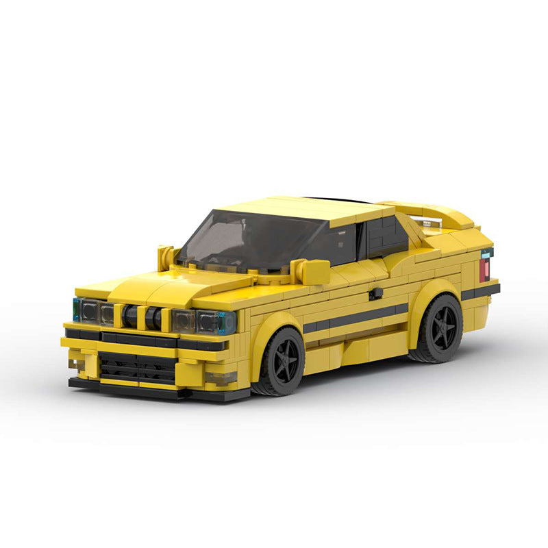 RevvBlox BMW M3 E36 model car in blue with detailed exterior and realistic design, showcasing scale model craftsmanship.