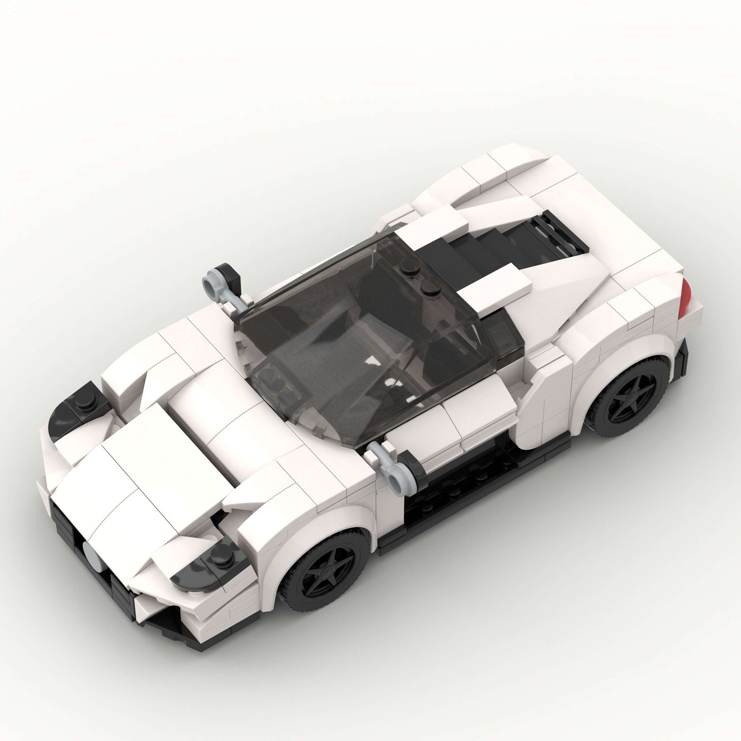Revvblox Maserati MC20 model car in detailed blue with interior and exterior features visible.