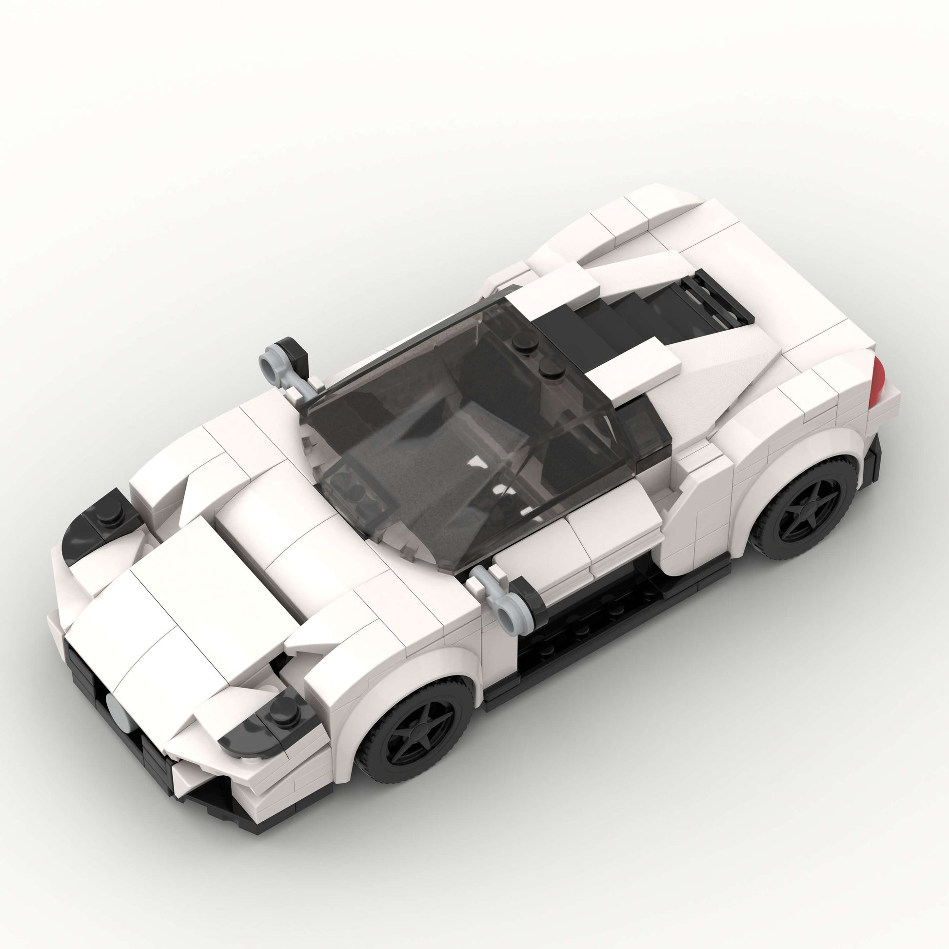 Revvblox Maserati MC20 model car in detailed blue with interior and exterior features visible.