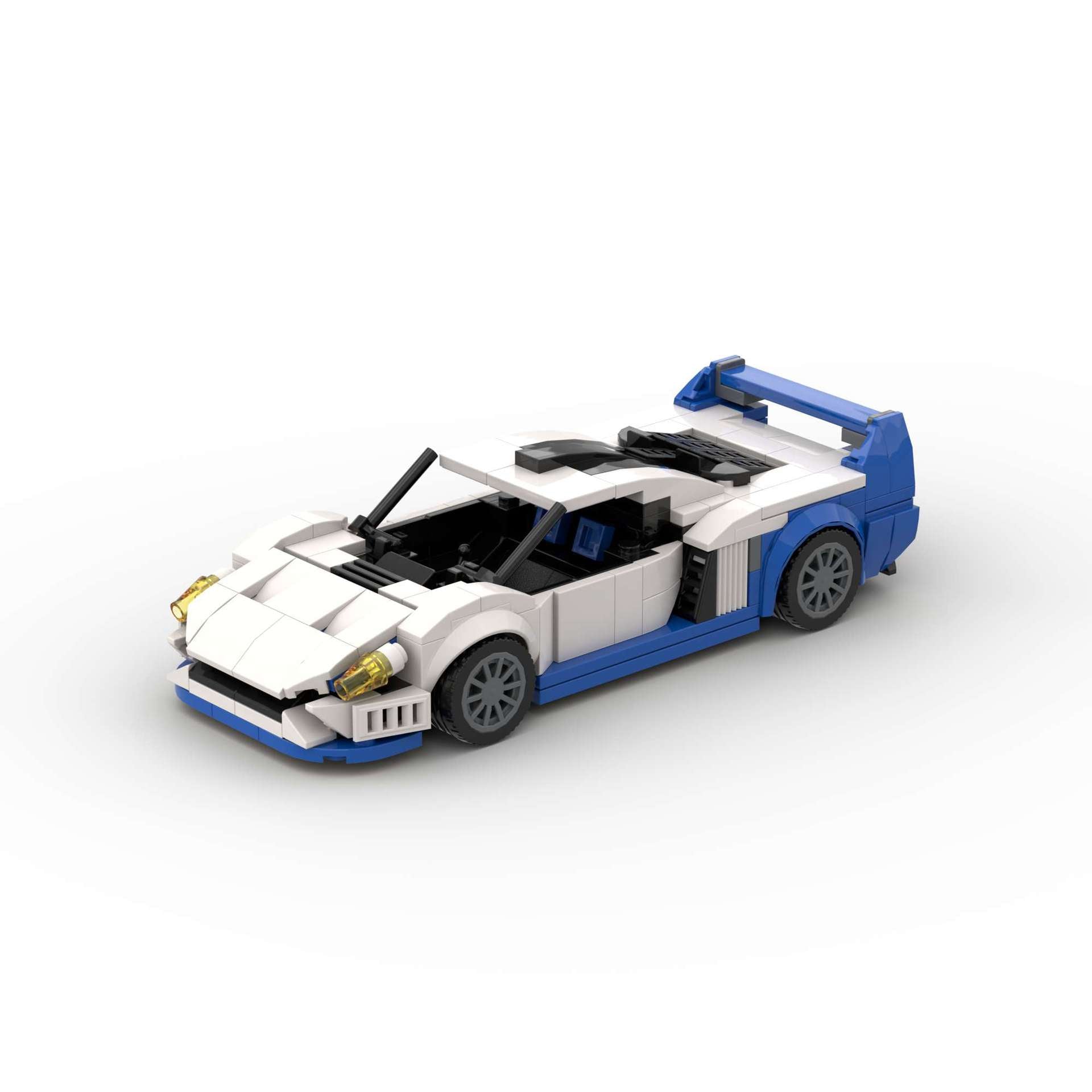RevBlox Maserati MC12 model car in blue with detailed interior and exterior features, showcasing realistic design and craftsmanship.