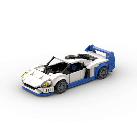 RevBlox Maserati MC12 model car in blue with detailed interior and exterior features, showcasing realistic design and craftsmanship.