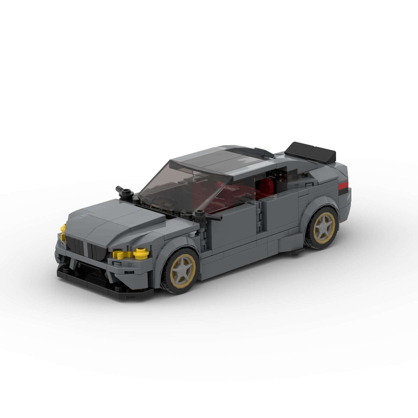 Revell RevvBlox BMW M5 CS model car with detailed black and red design, showcasing the sleek sports car exterior.