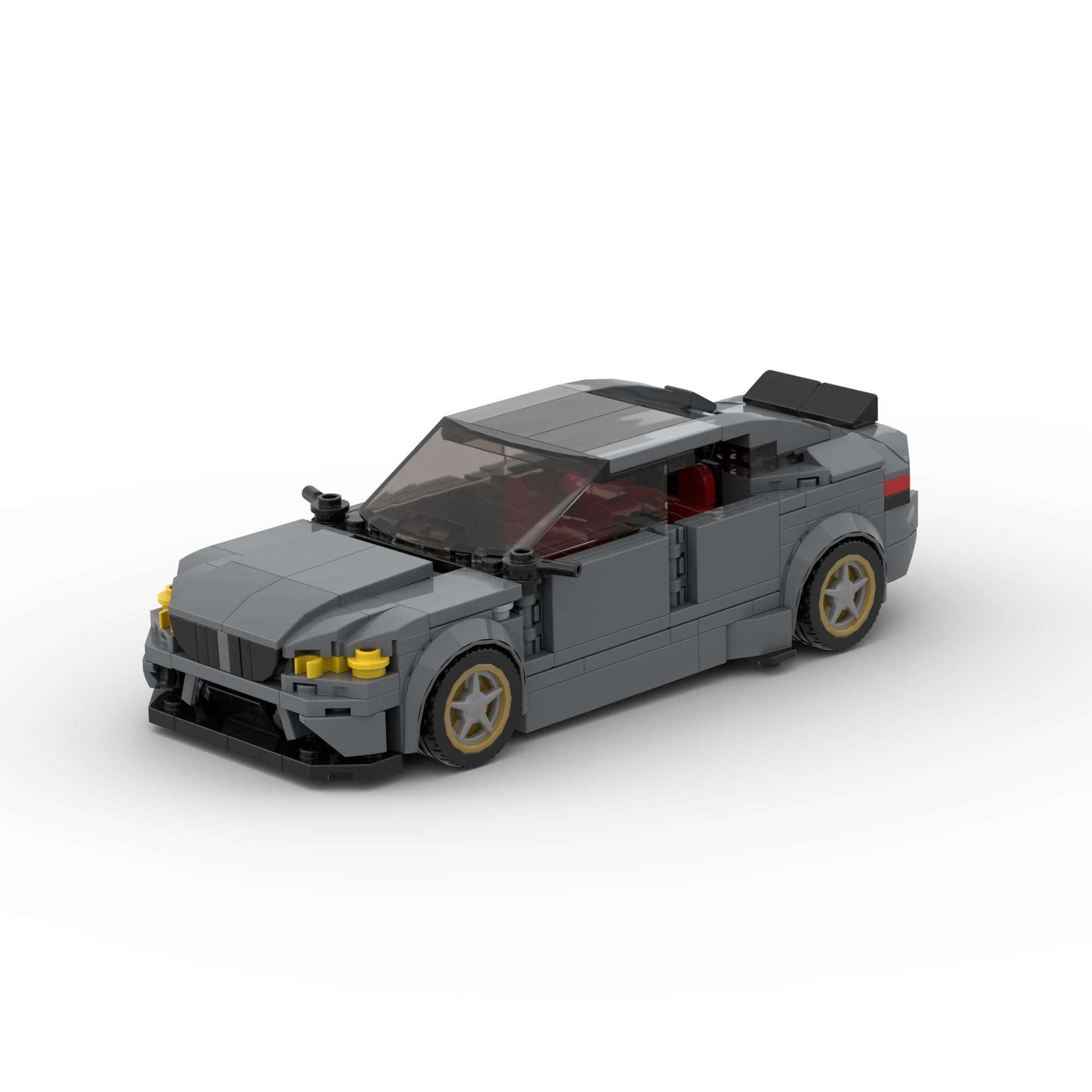 Revell RevvBlox BMW M5 CS model car with detailed black and red design, showcasing the sleek sports car exterior.