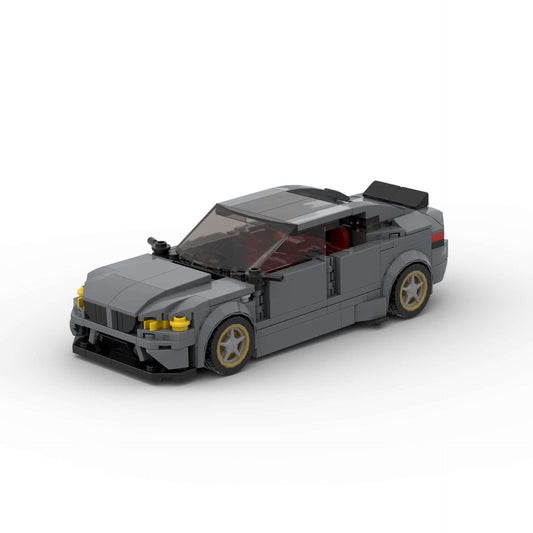 Revell RevvBlox BMW M5 CS model car with detailed black and red design, showcasing the sleek sports car exterior.