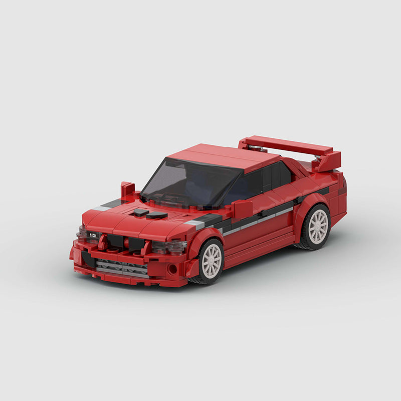 RevVBlox Mitsubishi Lancer EVO toy car with detailed exterior in red, showcasing sporty design and realistic features.
