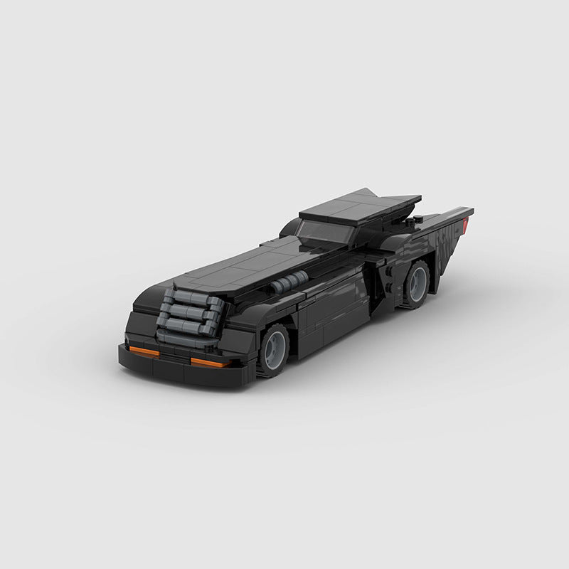 RevvBlox Batmobile toy model with detailed black and gray design, featuring sleek aerodynamic details and realistic Batmobile features.