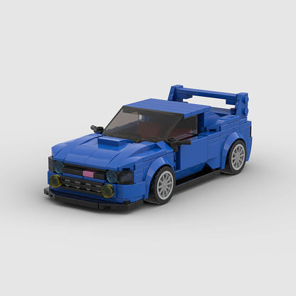 Red RevvBlox Subaru Impreza model car with detailed exterior and realistic design on a plain background.