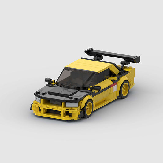 RevVBlox Nissan GT-R R34 model car in blue with detailed exterior and realistic features, displayed on a plain background.