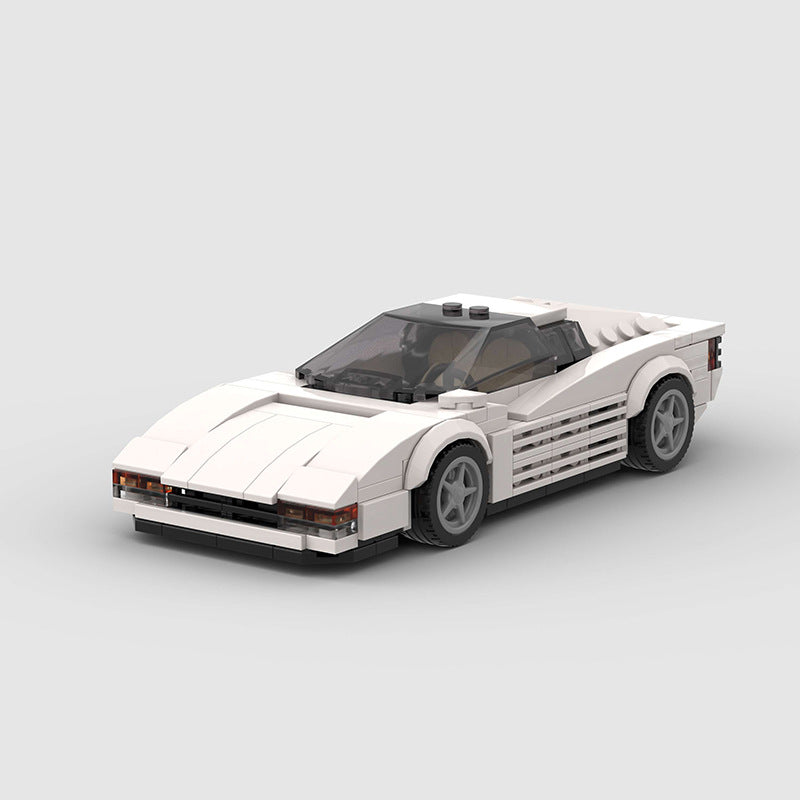 Revell Ferrari Testarossa model car by RevvBlox, detailed red sports car with sleek design and realistic features.