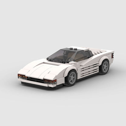 Revell Ferrari Testarossa model car by RevvBlox, detailed red sports car with sleek design and realistic features.