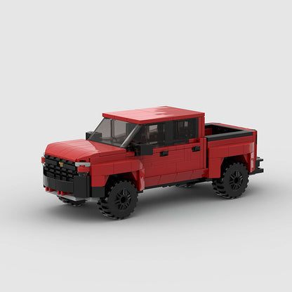 RevvBlox Chevrolet Silverado toy truck with detailed blue and silver design, showcasing realistic truck features and sturdy construction.