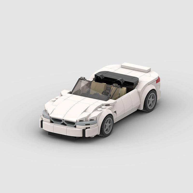 RevVBlox BMW Z4 Roadster model car with detailed exterior, open-top design, and sleek silver finish.