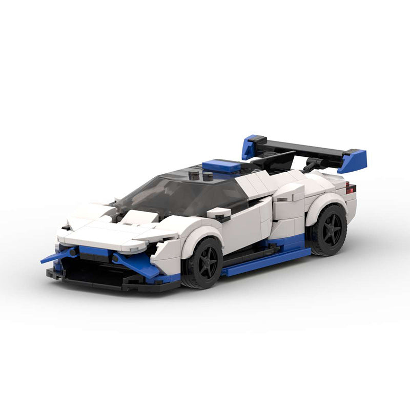 White and blue LEGO sports car model with black wheels and rear spoiler on white background