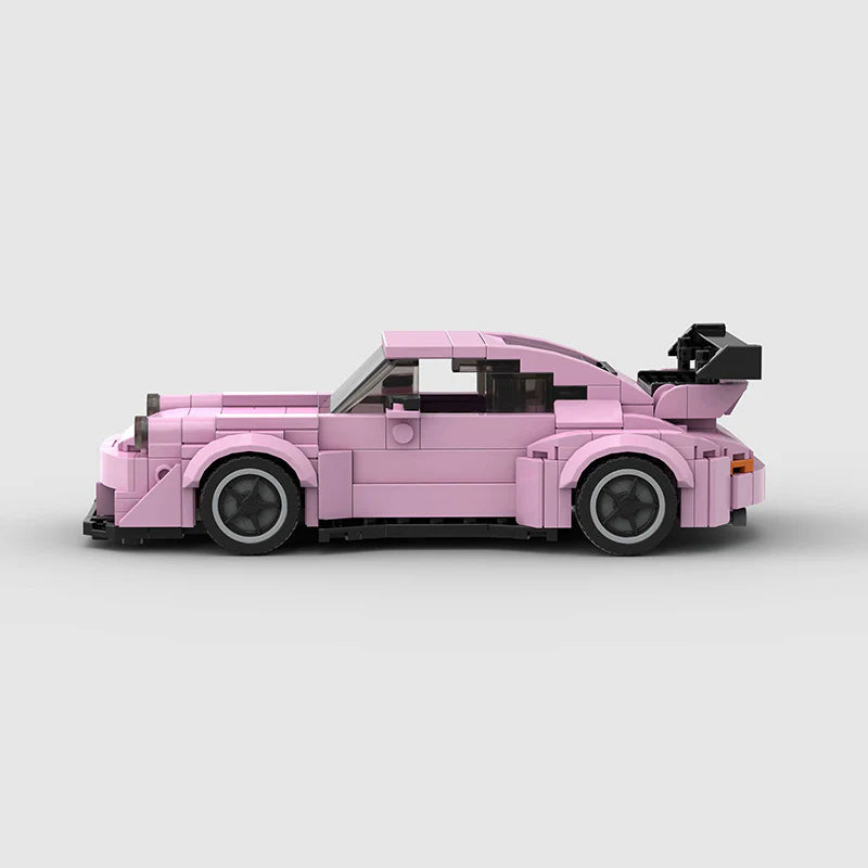 Revvblox Porsche 911 RWB Pink Edition model car with detailed exterior in vibrant pink, showcasing sleek sports car design.