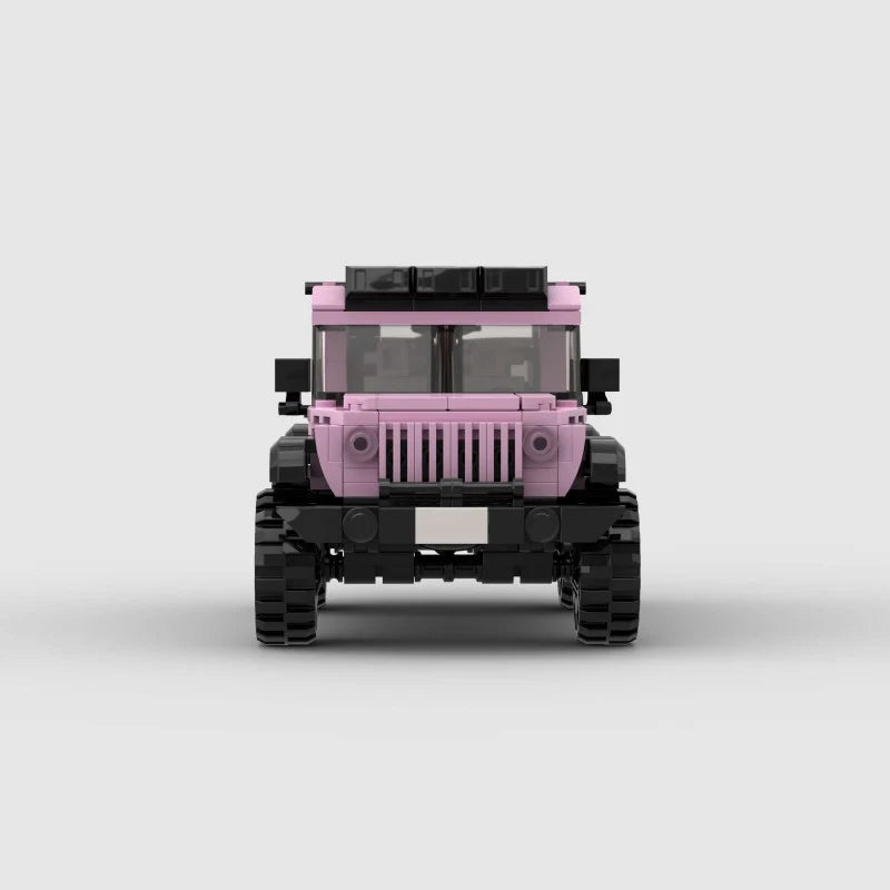 Pink edition RevvBlox Jeep Wrangler toy with detailed exterior and realistic features, designed for young automotive enthusiasts.