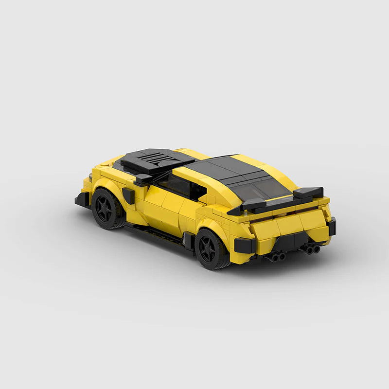 RevvBlox Chevrolet Camaro Bumblebee from Transformers LEGO-style building block toy on display.