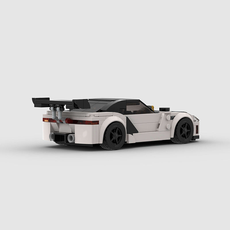 RevVBlox Mitsubishi GTO 3000GT scale model car with detailed exterior and sleek black finish, collectible diecast toy.