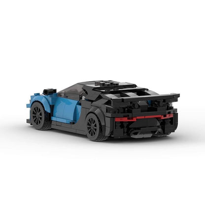 Black and blue LEGO sports car model with rear spoiler on white background