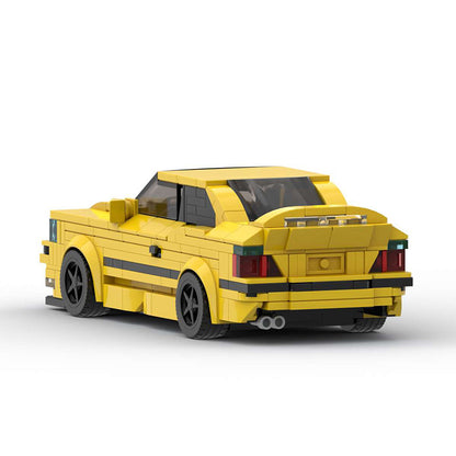 RevvBlox BMW M3 E36 model car in blue with detailed exterior and interior features, showcasing a realistic miniature vehicle.