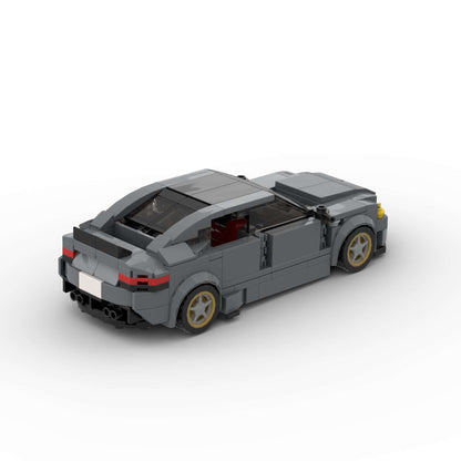 RevvBlox BMW M5 CS model car in blue with detailed exterior, showcasing sleek design and sporty features.