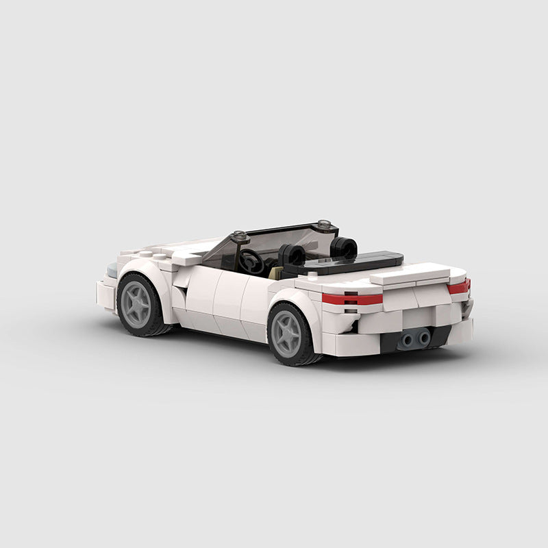 RevvBlox BMW Z4 Roadster diecast model car with detailed exterior and open convertible top, realistic automotive replica.