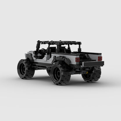 RevvBlox Jeep Gladiator model, detailed miniature toy truck with rugged design and off-road features, on a white background.