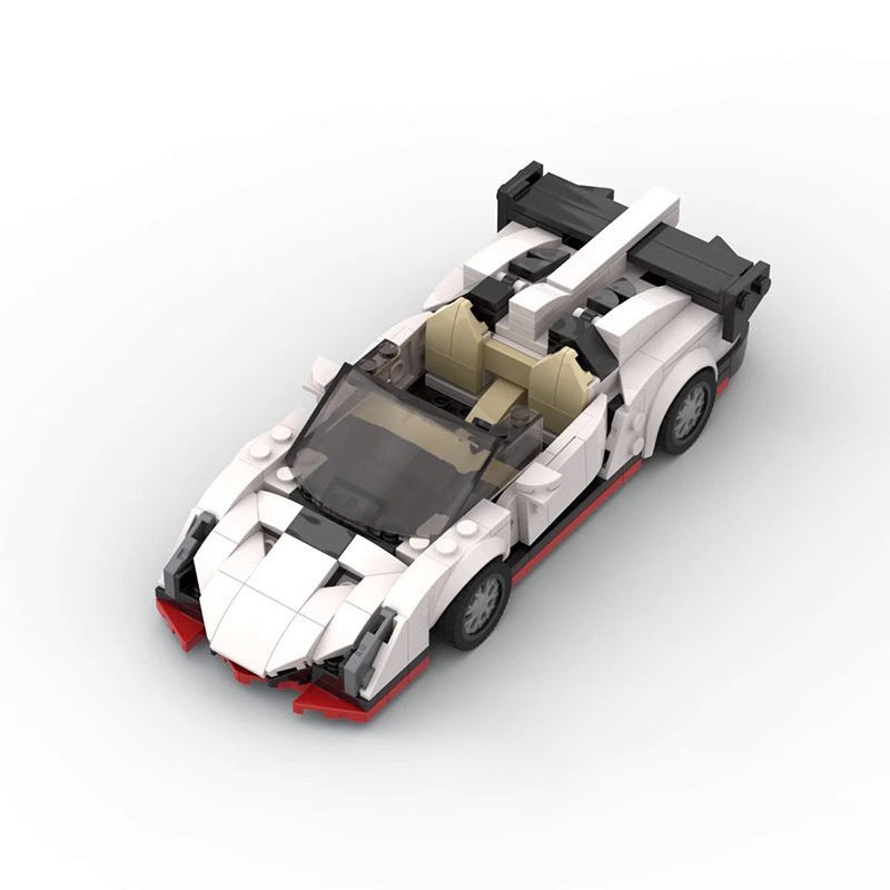 White and black LEGO sports car model with red accents and tan interior on white background